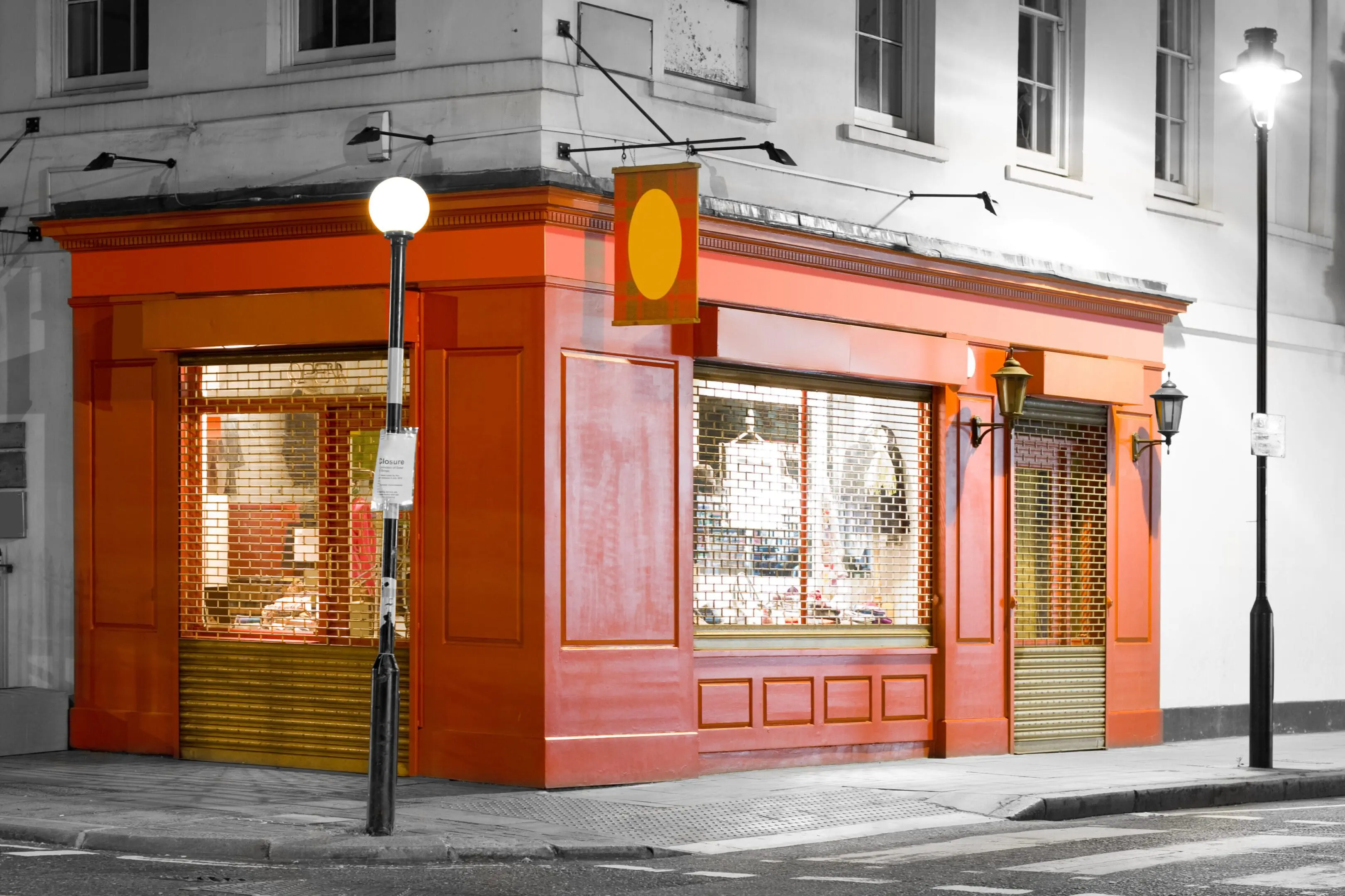 Orange storefront on a corner street.