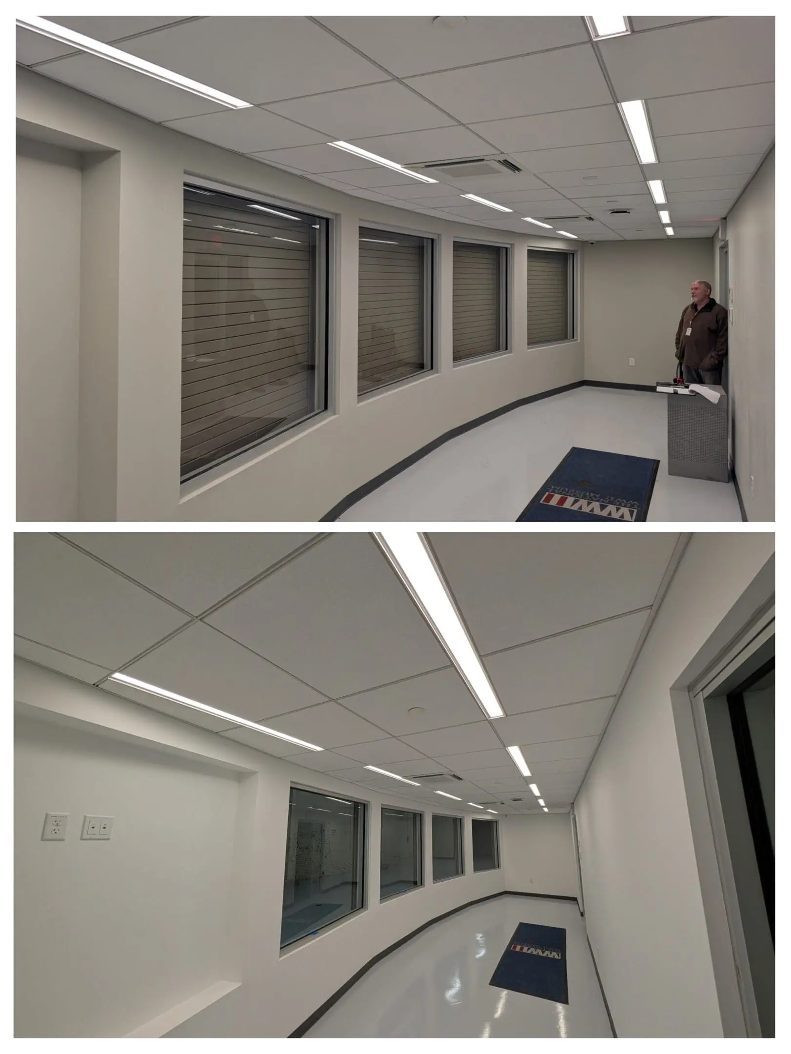 Empty modern hallway with overhead lights.